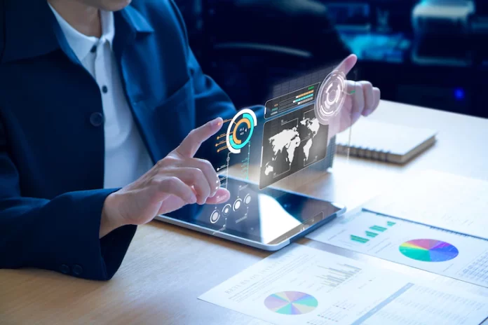 business-man-expanding-futuristic-virtual-screen-modern-tablet_101984-85